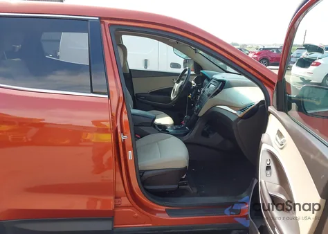 2015 Hyundai Santa Fe Sport 2.4L z USA, uszkodzony, nr VIN 5XYZTDLB0FG255995